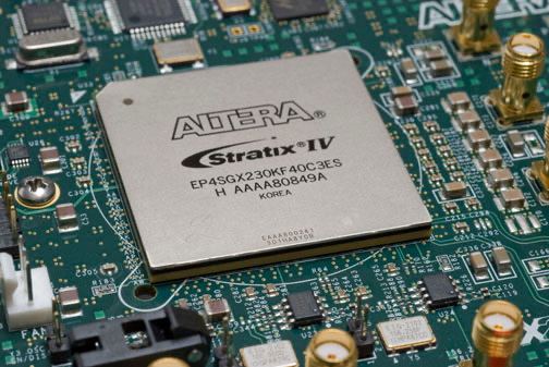 An Altera Stratix IV FPGA chip mounted on a circuit board